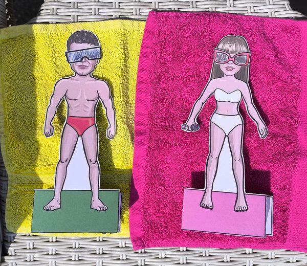 wo paper dolls sun bathing wearing sunglasses